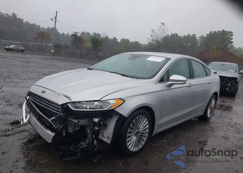 2014 Ford Fusion Hybrid Titanium z USA, uszkodzony, nr VIN 3FA6P0RUXER274315